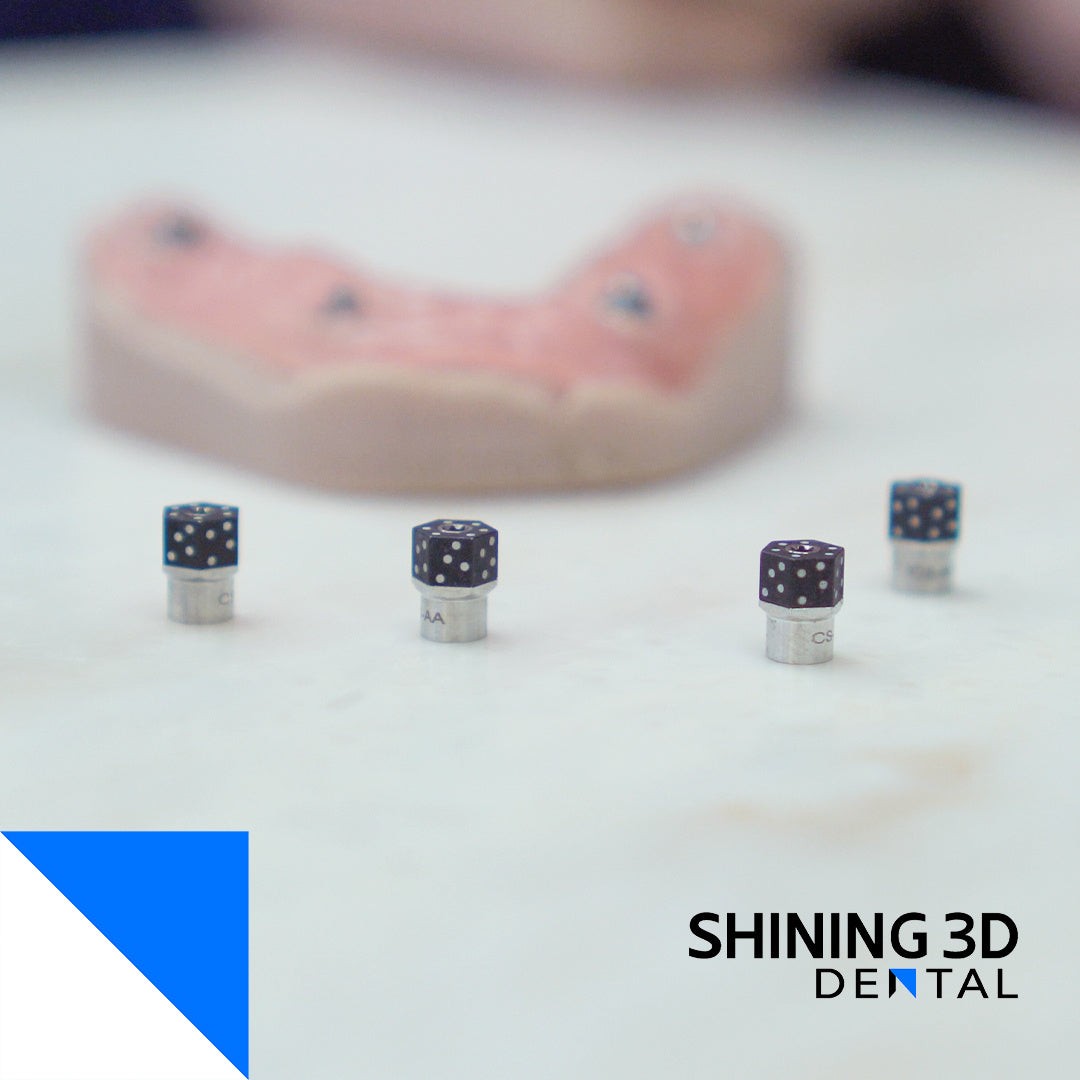 Shining 3D Cap Scanbody caps on a model